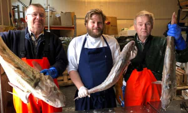 Kári Kristiansen, center, chef, with Ólavur Sjúðraberg, left, who have helped make the Faroe Bank cod so celebrated.