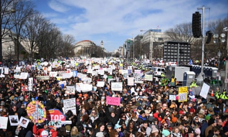 March for Our Lives protesters in Washington early on Saturday. Hundreds of thousands are expected to protest in US and around the world.