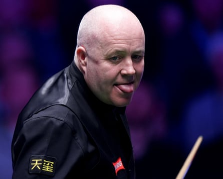 John Higgins during his match against Zhao Xintong