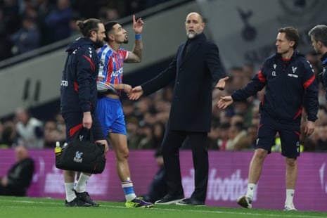 Daniel Munoz leaves the field with a bad looking shoulder injury.