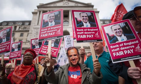Bank of England workers, striking over pay, stage a protest outside the Bank in the City of London.