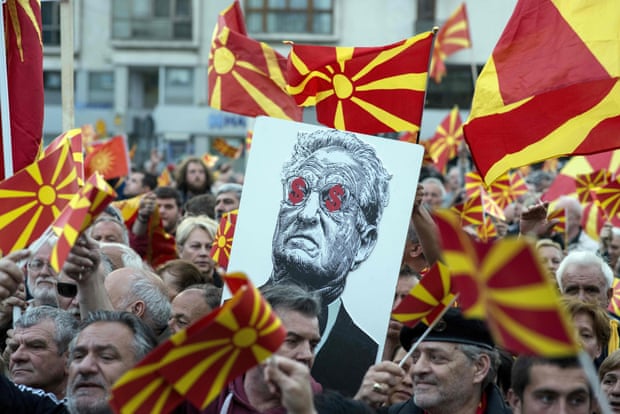 Protestors in Skopje, Macedonia, hold an antisemitic banner of Soros in 2017