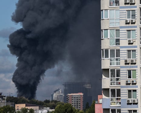 Smoke rises above the city following an air attack in Kyiv.