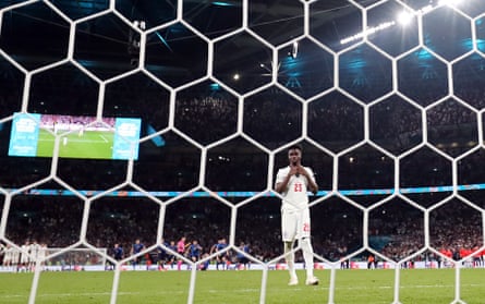 Bukayo Saka looks dejected after missing a penalty resulting in Italy winning the penalty shootout and Euro 2020