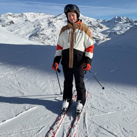 Fashion expert Peter Bevan in ski-wear on the slopes in France on a blue-sky day.