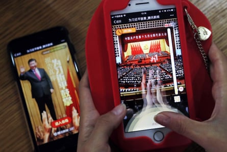 A student in Beijing plays a popular smartphone game called A Great Speech, Clap for Xi Jinping.