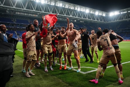 Almería’s players celebrate.