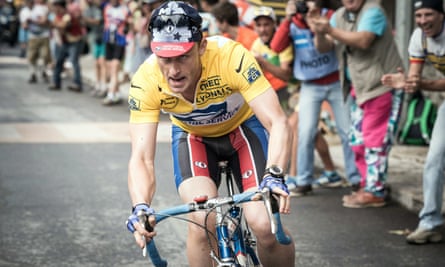 Ben Foster grimacing in yellow jersey on the bike, in The Program.