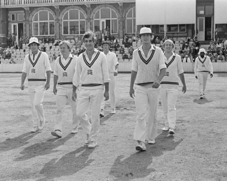 Mike Brearley (third left) leads his team on to the field at the Oval in September 1976
