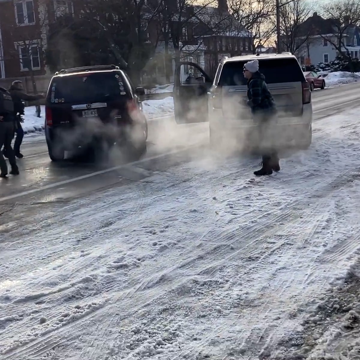 Woman in Minnesota fatally shot by ICE agent during raid, video shows | Minneapolis | The Guardian