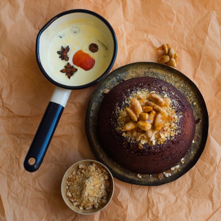 Nigel Slater’s steamed chocolate pudding, praline and spiced cream recipe.