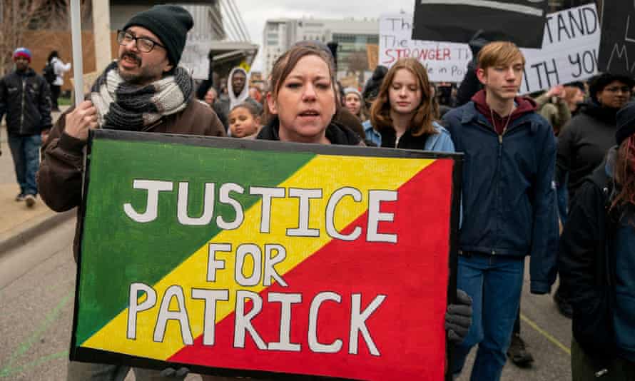 Demonstrators protest the killing of Lyoya who was shot and killed by a Grand Rapids police officer during a traffic stop.