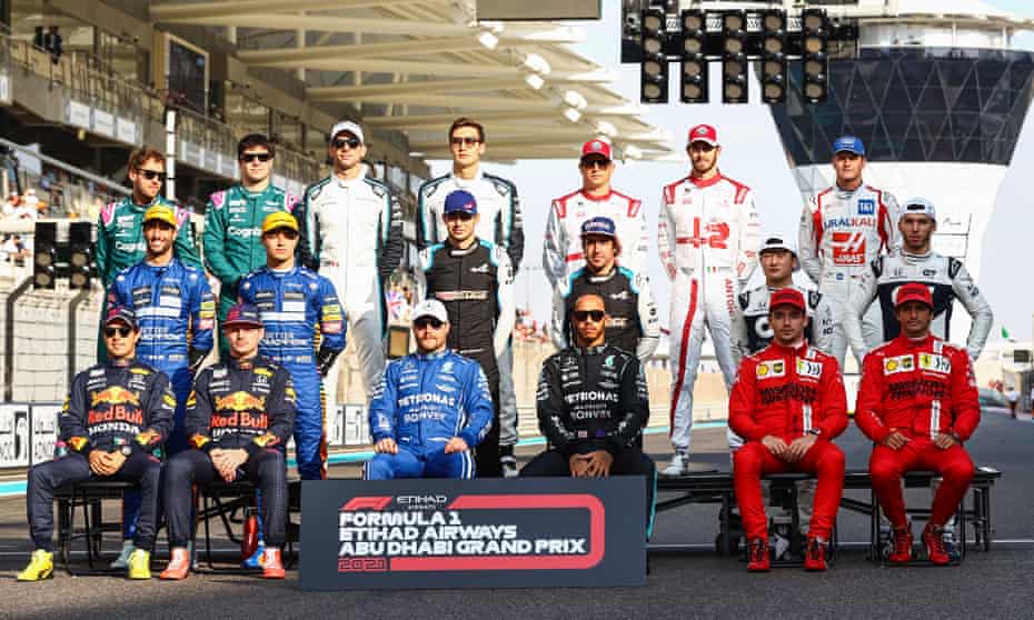 F1 drivers pose for an end of season picture on the grid prior to the Abu Dhabi F1 Grand Prix at Yas Marina Circuit.