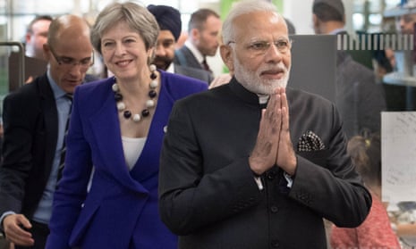 Theresa May and Narendra Modi visit the Francis Crick Institute in London.