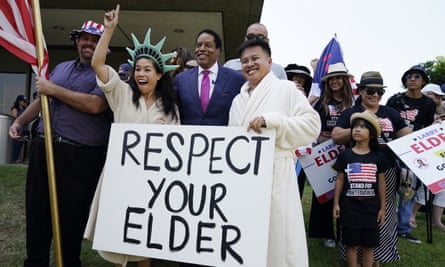 Larry Elder poses for pictures with supporters during a campaign stop in Norwalk, California, in July.