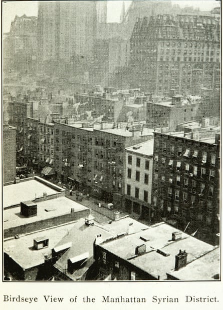 A birdâÂÂs eye view of tenement buildings on a New York City street