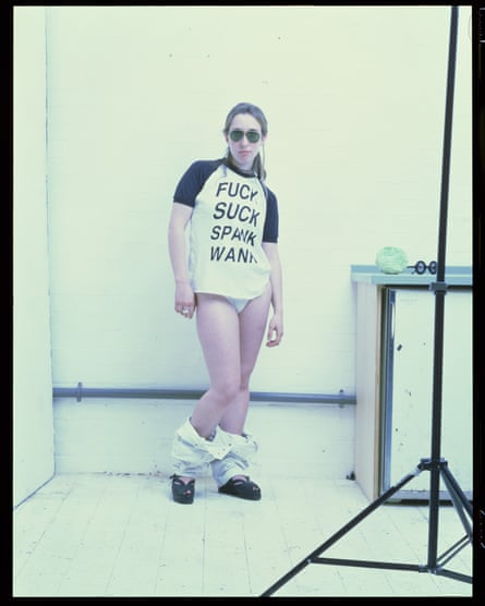 A woman in knickers and an expletive strewn t-shirt