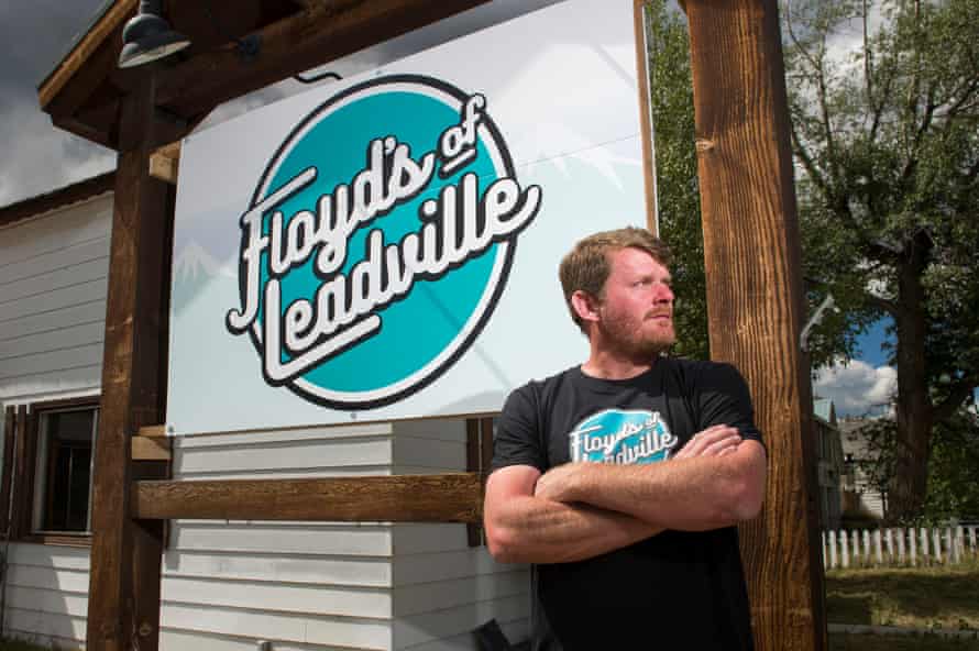 Floyd Landis poses for a portrait in front of his office in Leadville, Colorado.