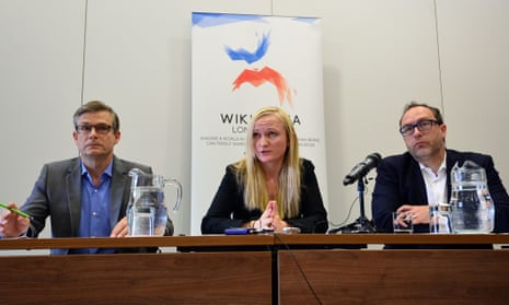 Lila Tretikov, center, and Wikipedia co-founder, Jimmy Wales, right, attend a press conference in central London on August 6, 2014 ahead of the Wikimania conference.