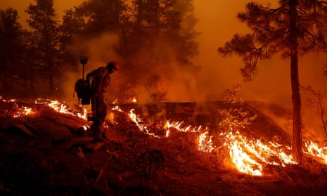 Dixie Fire rages in California<br>U.S. Forest Service firefighter Ben Foley lights backfires to slow the spread of the Dixie Fire, a wildfire near the town of Greenville, California, U.S. August 6, 2021. REUTERS/Fred Greaves