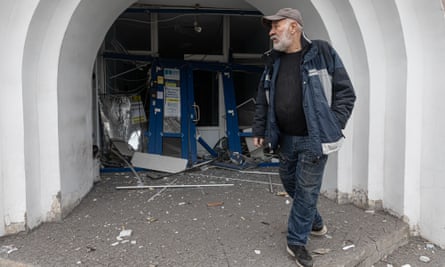 Anatoly Grigovivch outside her daughter’s war damaged office