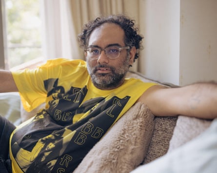 Gaggan Anand sitting on a sofa, looking at the camera