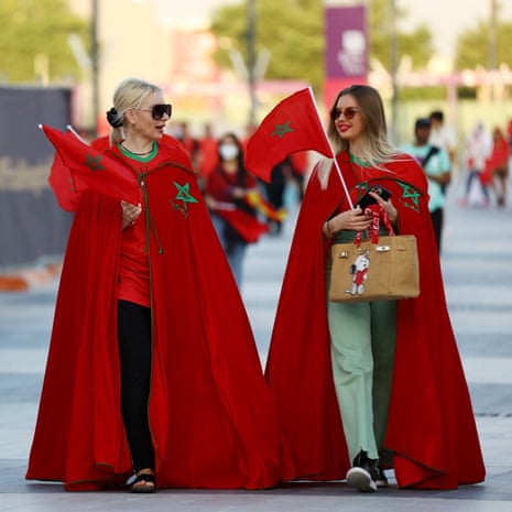 Two Moroccan fans in extravagant cloaks ahead of the round of 16 clash with Spain.