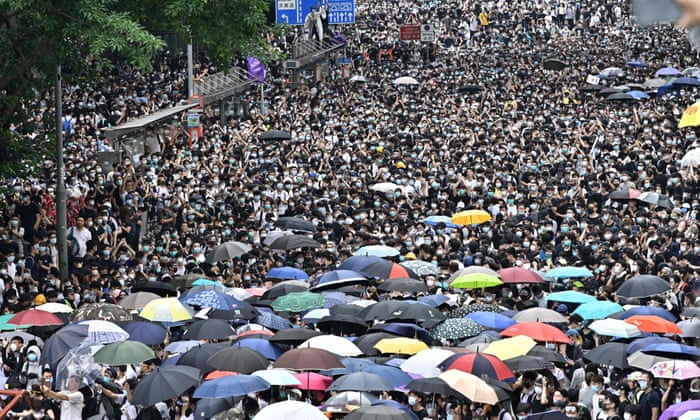 Protesters occupy two main highways near the government headquarters in Hong Kong on 12 June as the city braced for another mass rally in a show of strength against the government over a divisive plan to allow extraditions to China.