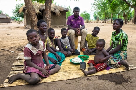 Lucia Bello with some of her children and her sister’s orphans, Aloufasi village, Nsanje District, Malawi
