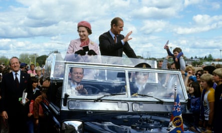 Queen Elizabeth ll and Prince Philip, Duke of Edinburgh wave to wellwishers in Wellington, New Zealand in 1981.