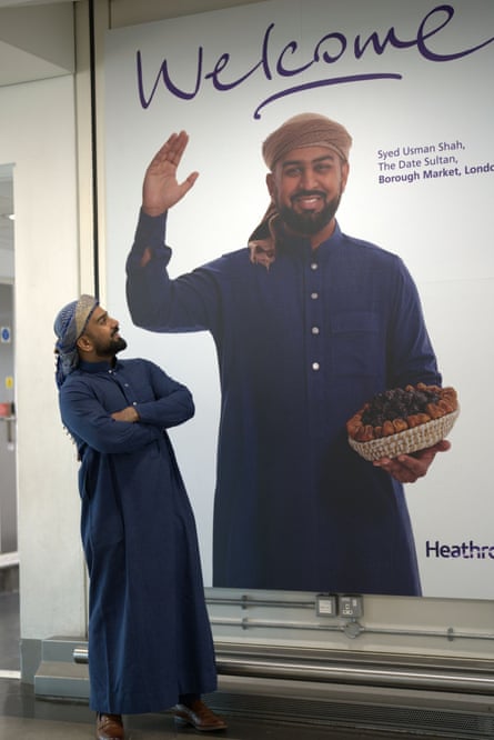 Syed Usman Shah with his ‘Welcome to Heathrow’ poster.