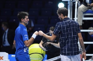Russia’s Daniil Medvedev (R) following his two set win over Serbia’s Novak Djokovic.