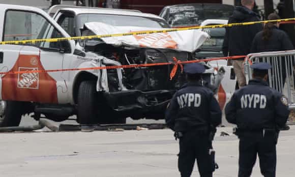 Workers continue to collect evidence around truck used to strike pedestrians in Manhattan