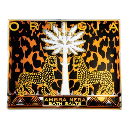 Ortigia Ambra Nera bath salts package with drawing of 2 leopards and tree against leopard print