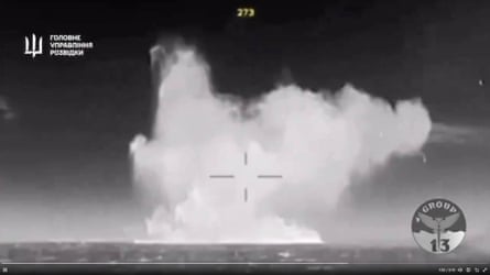 Unverified footage of what Ukrainian forces say is a destroyed a Russian missile boat from the Black Sea Fleet in a special operation off Russian-occupied Crimea