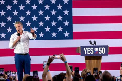 California Governor Gavin Newsom speaks at a "Yes On Prop 50" volunteer event at the LA Convention Center.