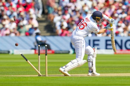Joe Root is bowled by Jasprit Bumrah for 104.