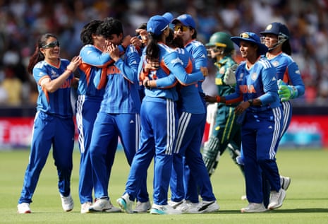 The Indian team celebrate the wicket of Phoebe Litchfield