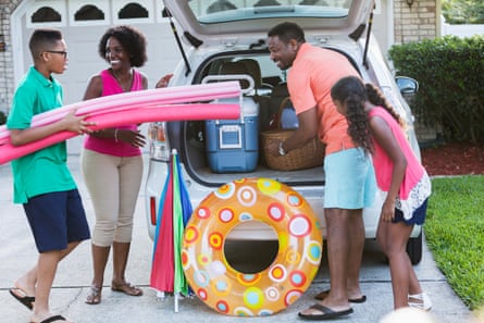 Ready for summer: a family get packed up. But take care to avoid the worst of the traffic.