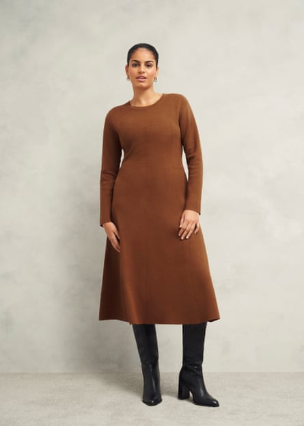 Model wearing a brown knitted dress.