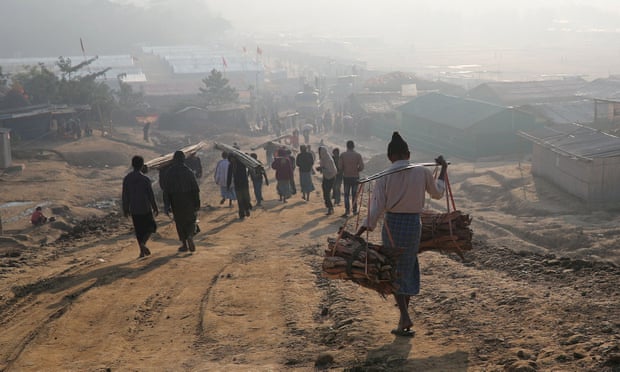 Rohingya refugees walk at Jamtoli camp in the morning in Cox's Bazar, Bangladesh