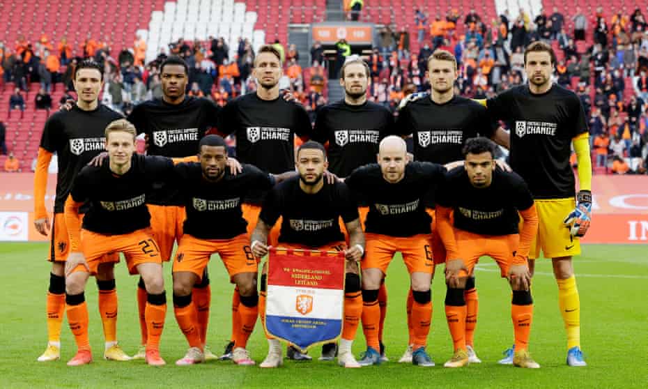The Netherlands players wear ‘football supports change’ T-shirts before a World Cup qualifier against Latvia in March to draw attention to issues in Qatar.
