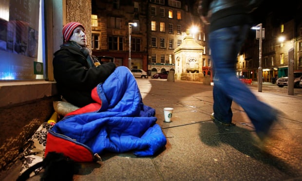 Miranda Tizard sits after midnight trying to beg up to the sum of £18 which will buy her a bed in a B&B in Leith.