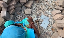 A woman breaking sandstone in Rajasthan, India. Photograph: Romita Saluja