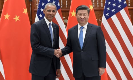 Barack Obama and Xi Jinping shake hands before the G20 summit.