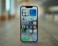 Apple iPhone 17e home screen displaying apps and London weather widget.
