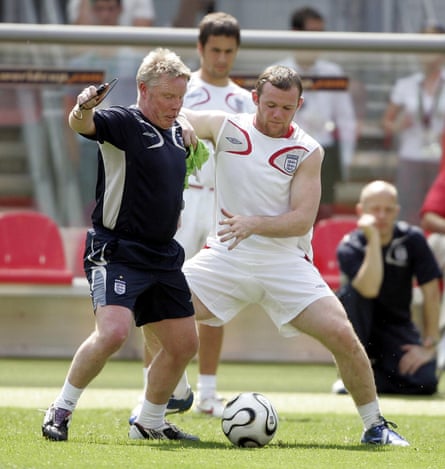 Lee takes part in a training session with Wayne Rooney during the 2006 World Cup in Germany.