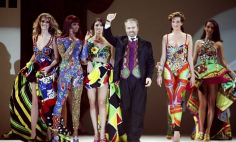 Gianni Versace takes a bow at a 1991 show in Los Angeles.