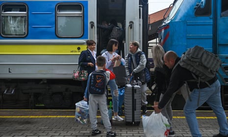 People, arriving in Poland from Ukraine by train, are seen at the railway station after the annexation of 15 percent of regions of Ukraine.