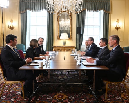 Starmer and Liz Kendall sit at a table in Downing Street with six senior figures from social media firms